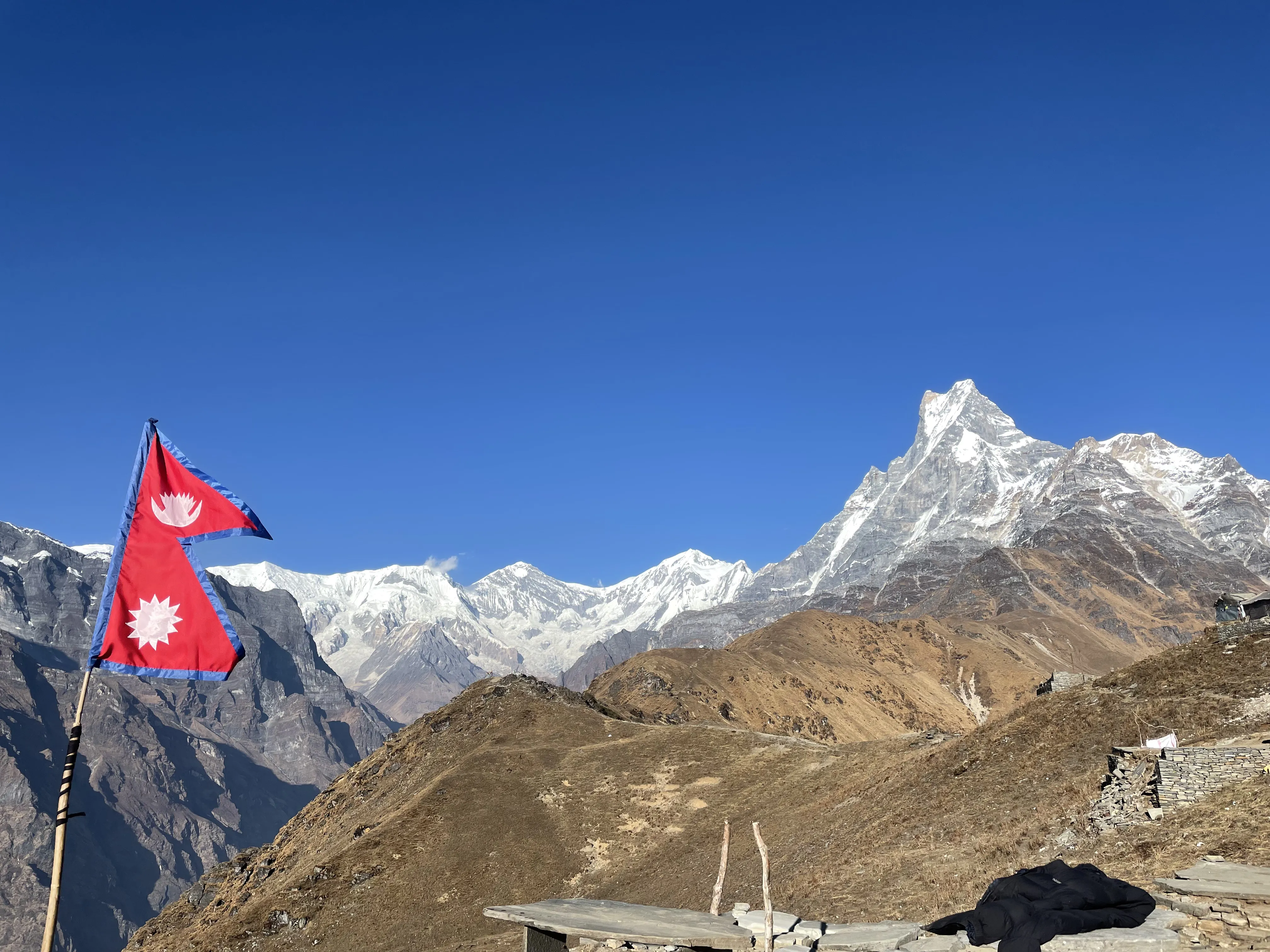 Nepal flag flying at Mardi Himal Base Camp